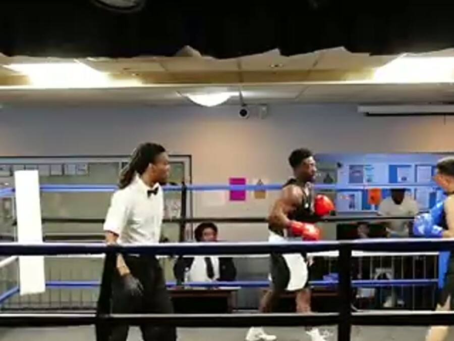Referee watching an exchange in the corner