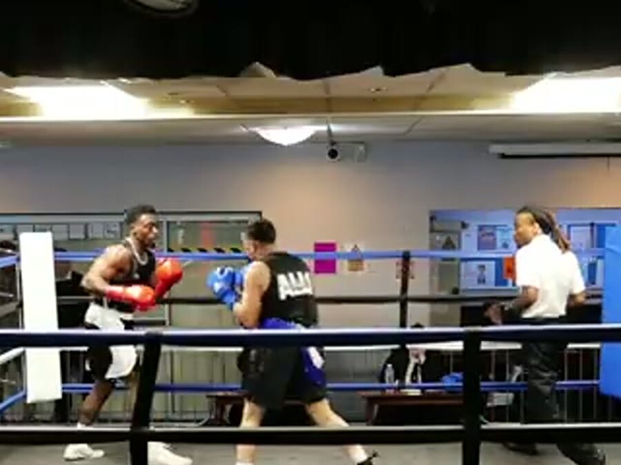 Boxer moving on the ropes between exchanges