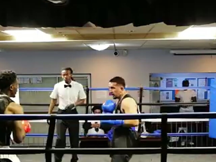 Boxers reset by the referee between exchanges